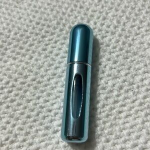 Refillable  perfume atomizers